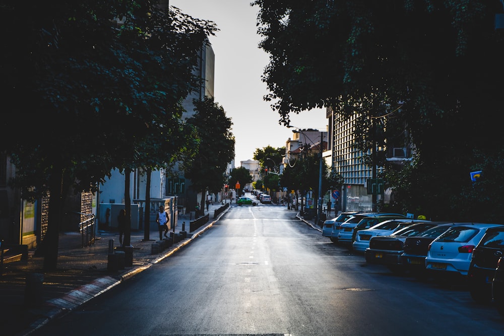 cars parked on side of the road during daytime