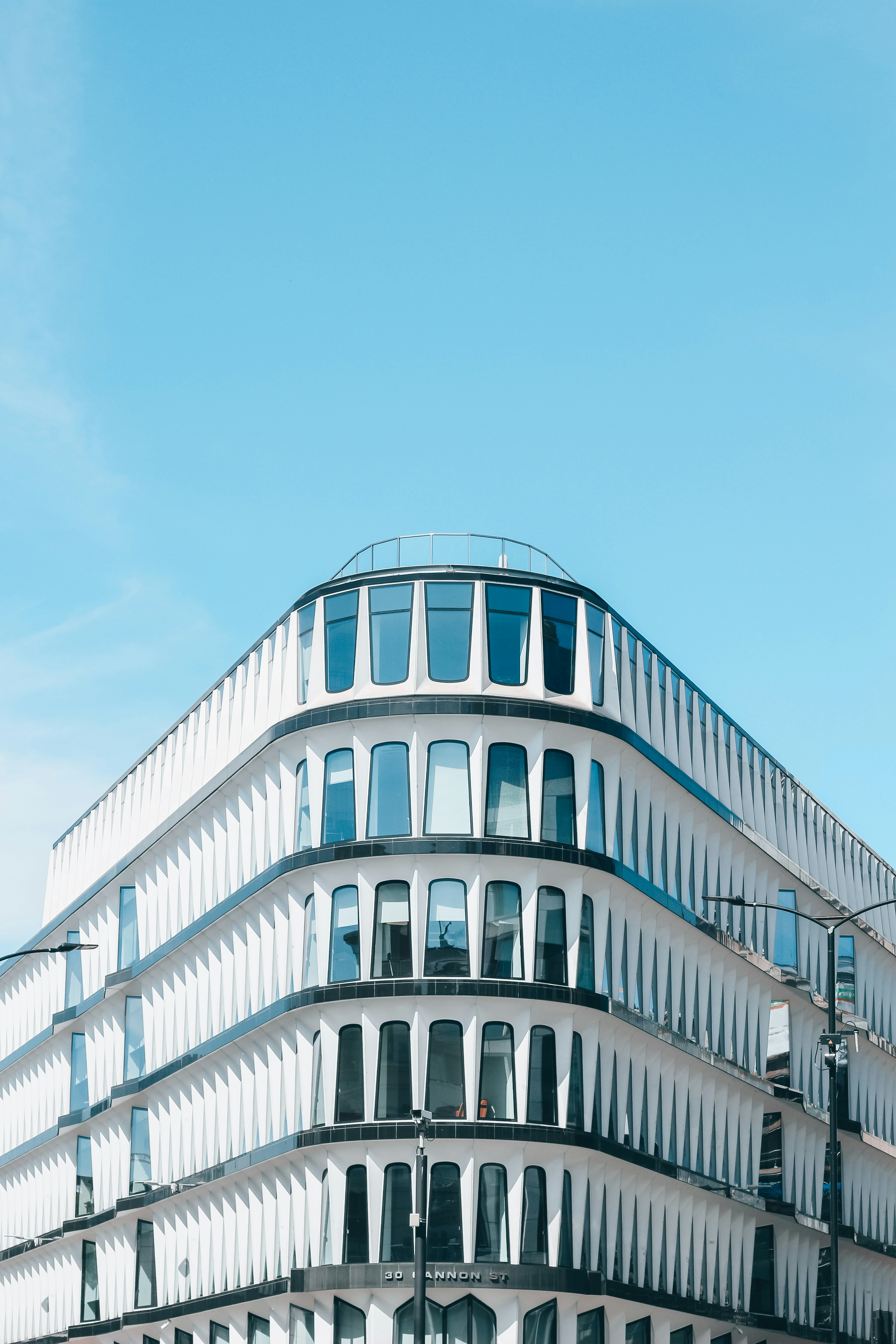 white concrete building under blue sky during daytime