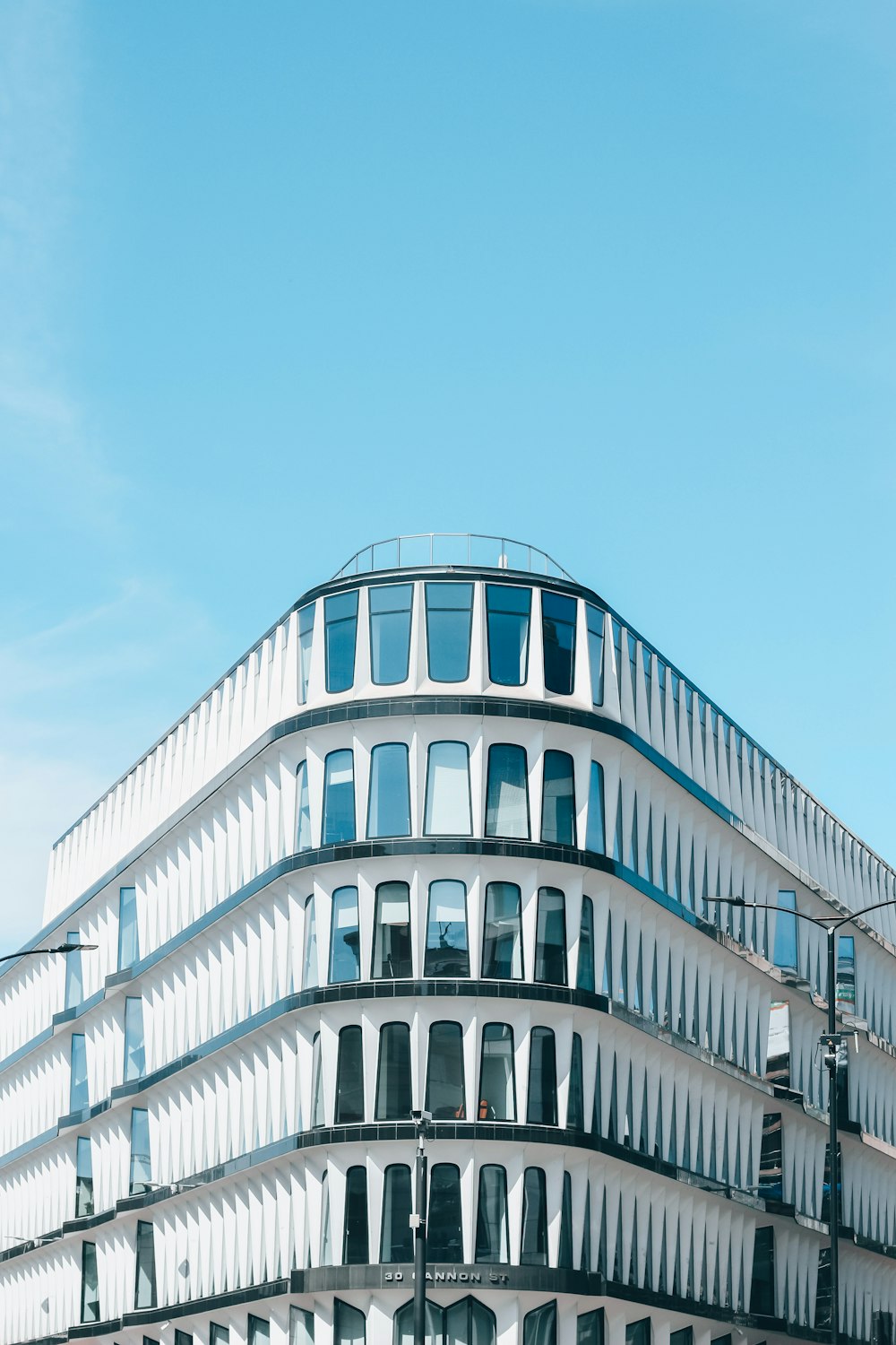 white concrete building under blue sky during daytime