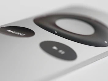 Close-up of a high-end TV remote with elegant design