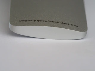 Close-up of a genuine Apple accessory with certification label visible.
