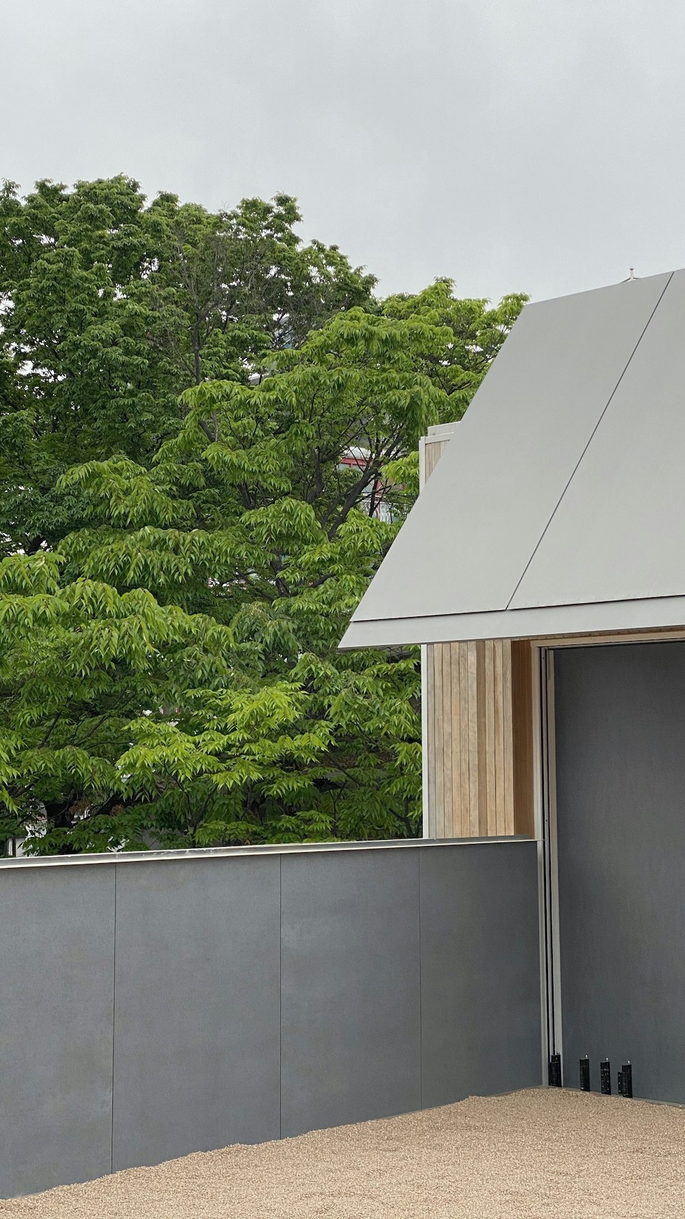 green trees beside brown wooden house during daytime