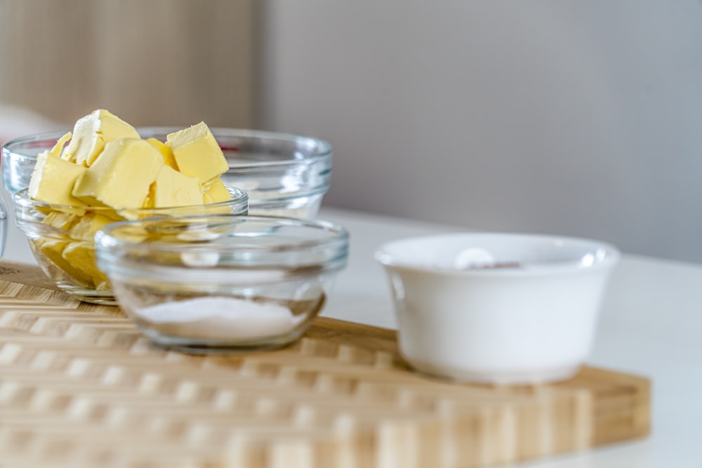 yellow flower on clear glass bowl