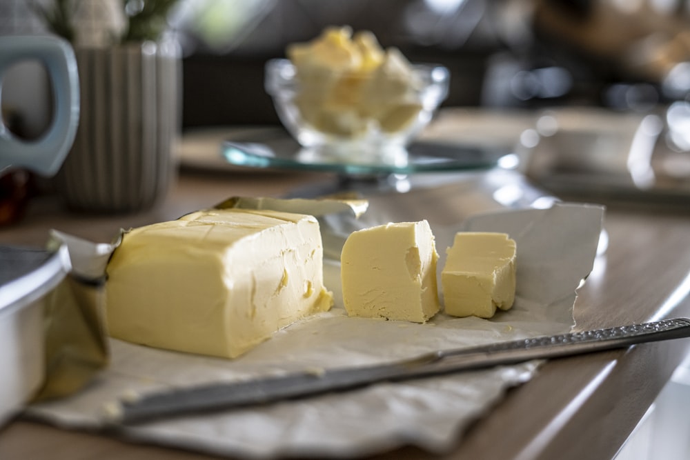 sliced cheese on clear glass plate