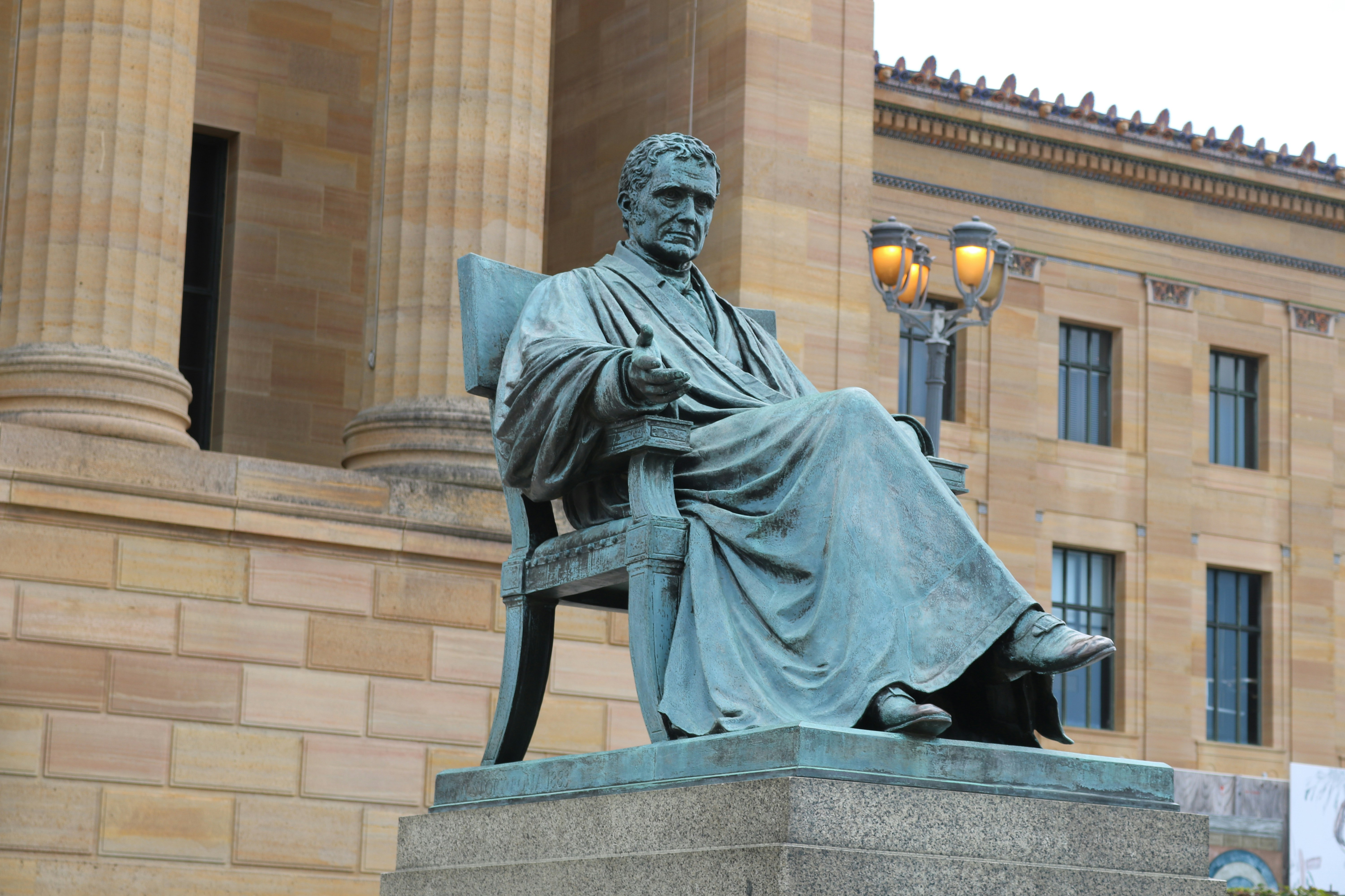 gray concrete statue of man