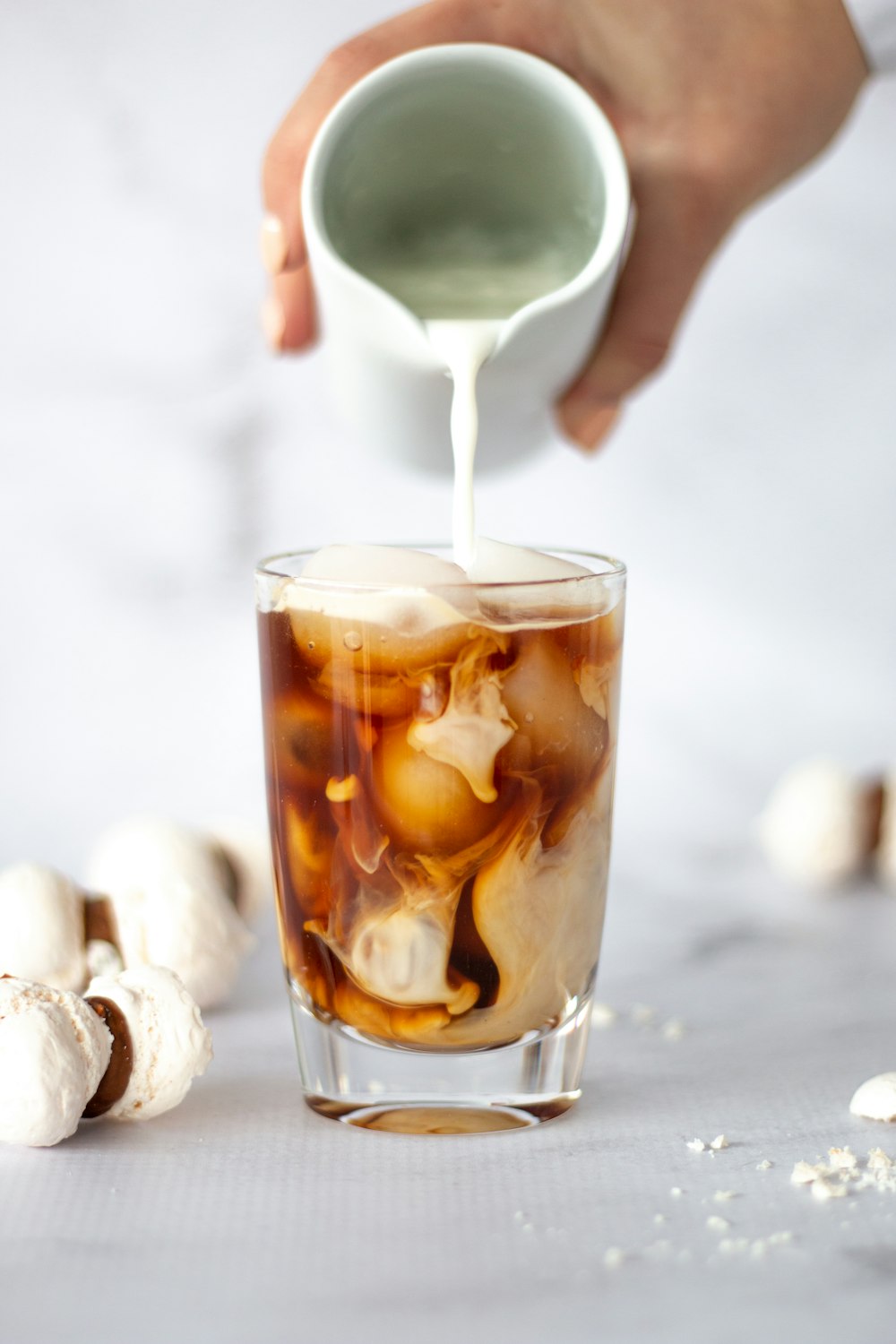 clear drinking glass with ice cubes