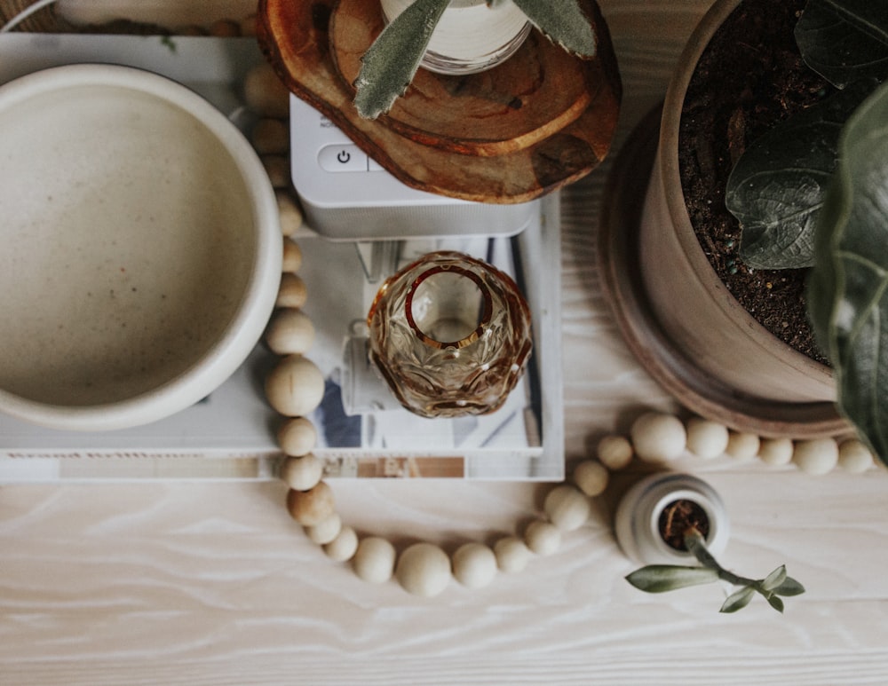 brown wooden tray with white round medication pill