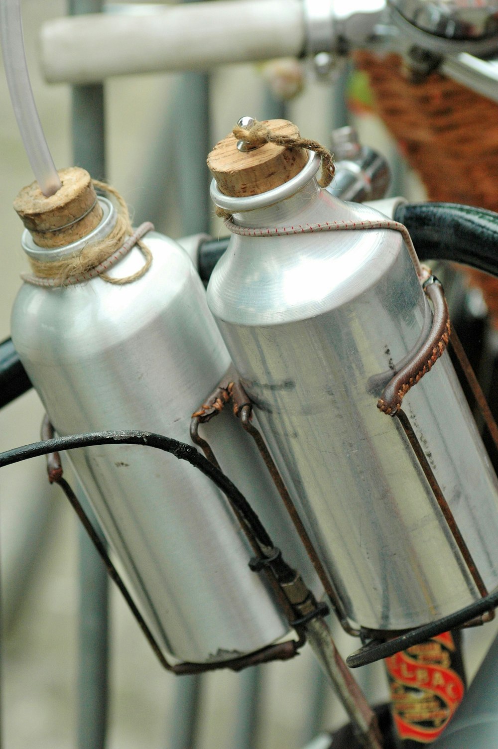 white plastic bottles on gray steel rack