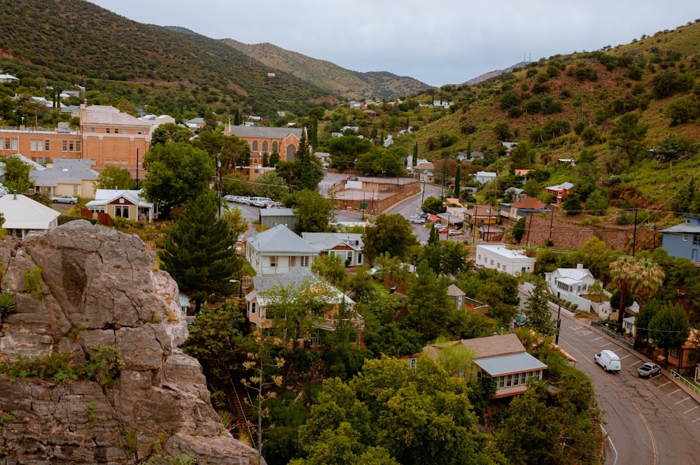 white and brown concrete houses on mountain during daytime