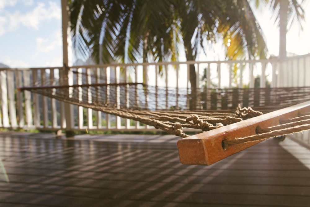 brown wooden stand on brown wooden dock during daytime