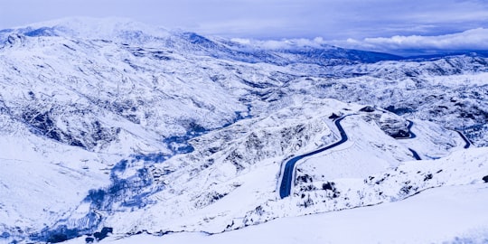 snow covered mountain during daytime in Tizi n'Tichka Morocco