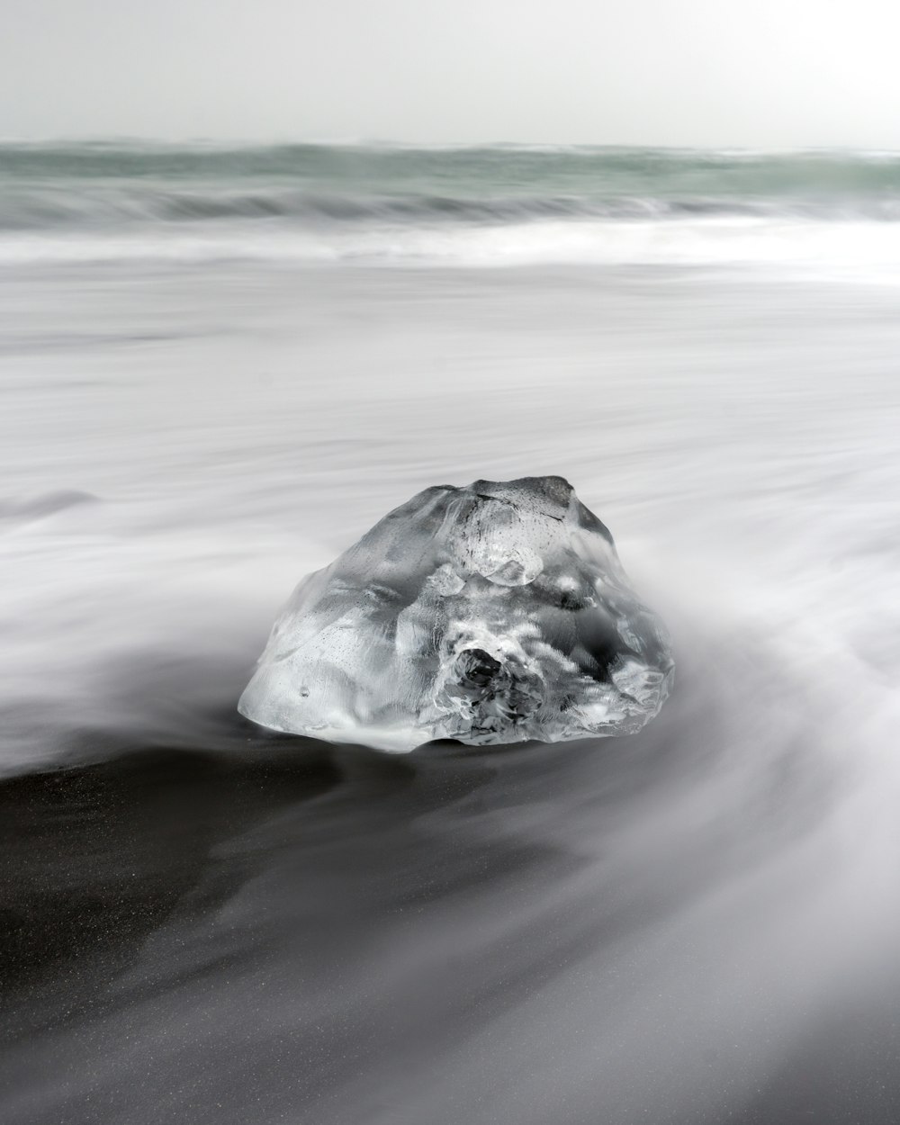 white ice on white sand