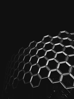 Hexagonal patterns subtly integrated into the architecture of the corporate office lobby.