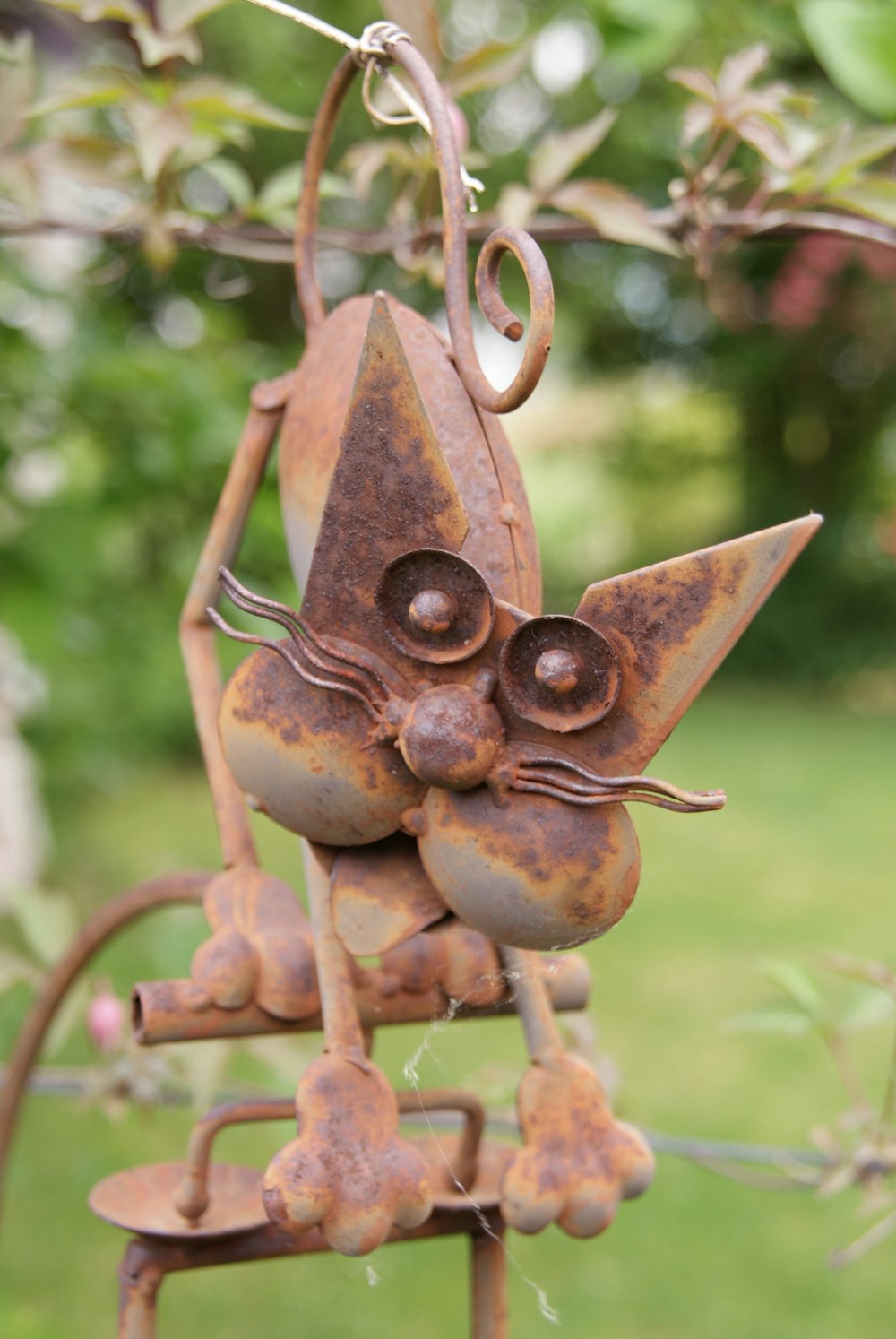 brown metal bird house ornament