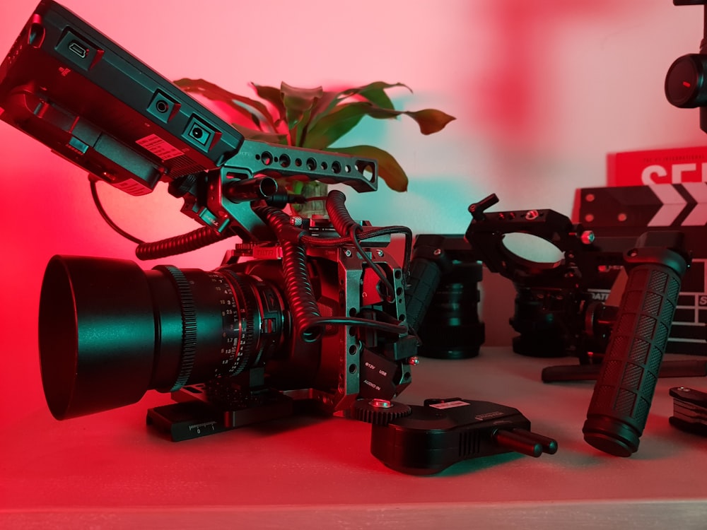 black dslr camera on red table