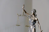 lady justice statue with scales and sword
