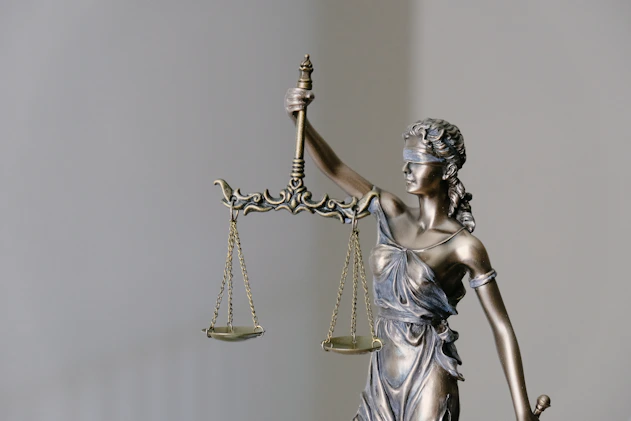 lady justice statue with scales and sword