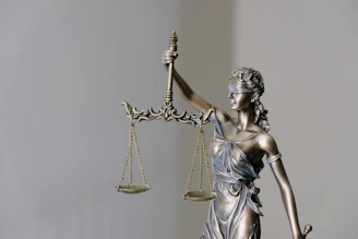 lady justice statue with scales and sword