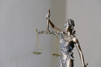 lady justice statue with scales and sword