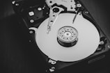 white and silver hard disk drive