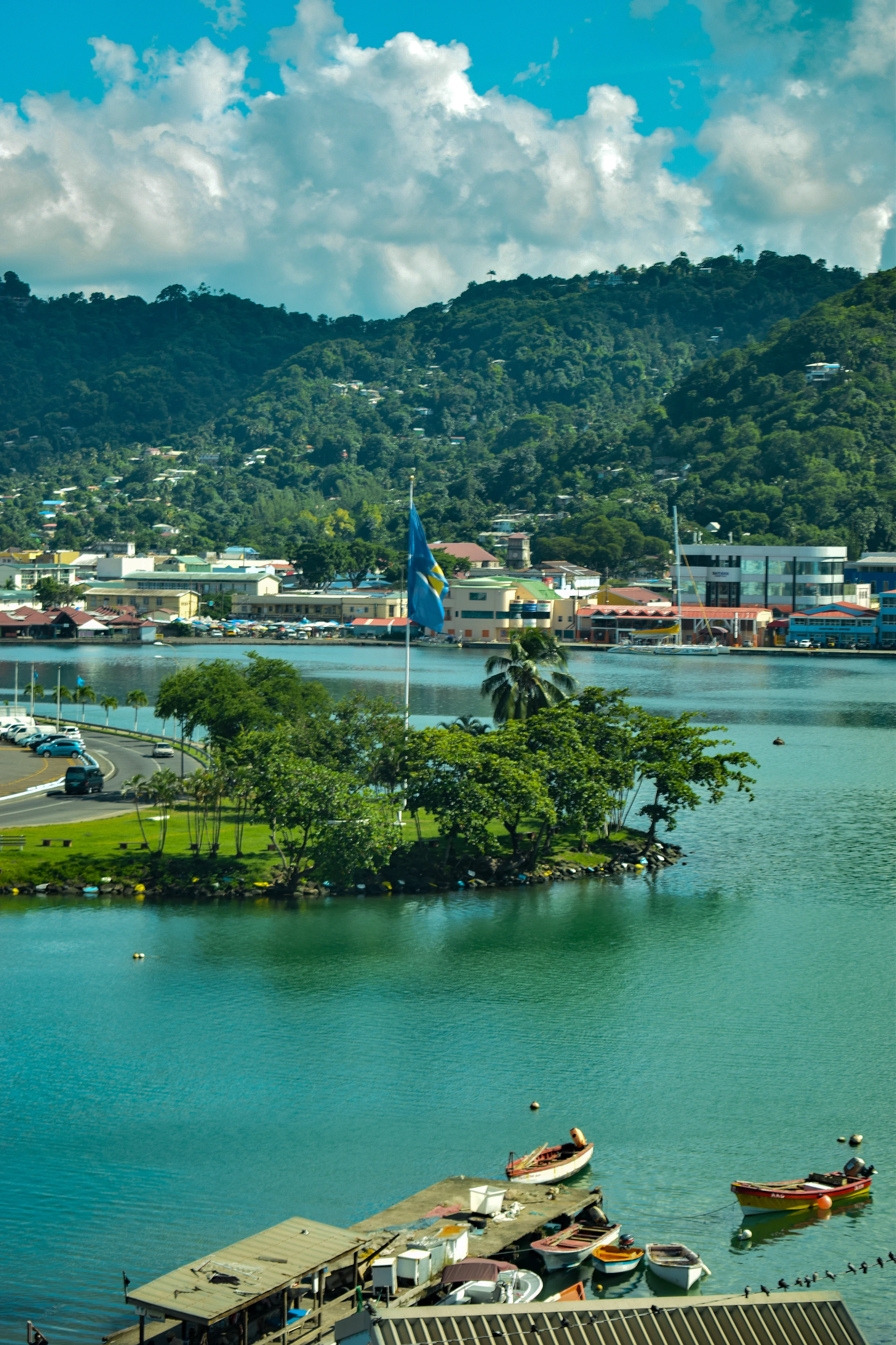 aerial view of city near body of water during daytime