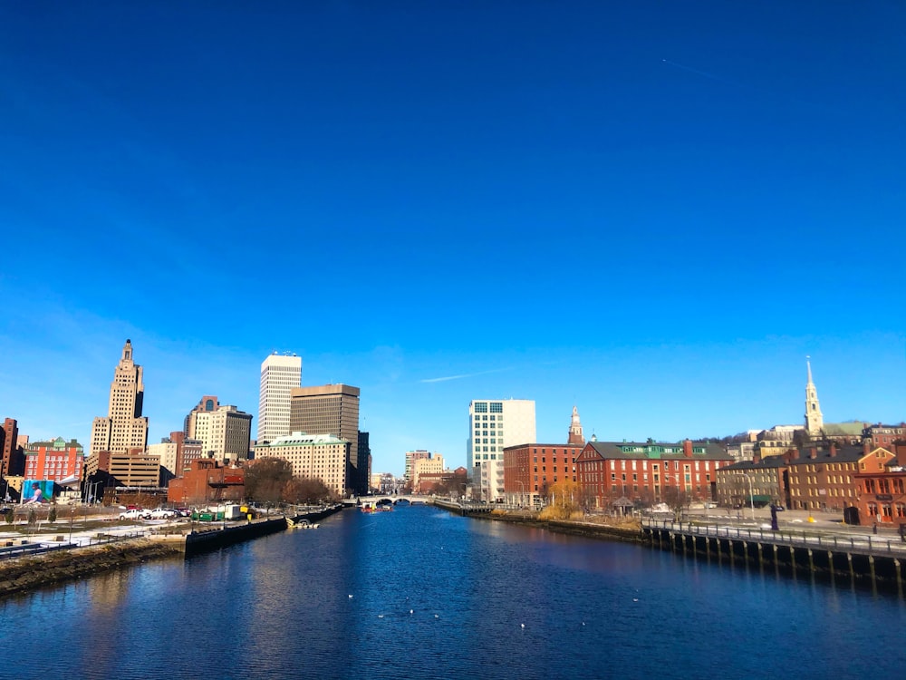 city skyline under blue sky during daytime