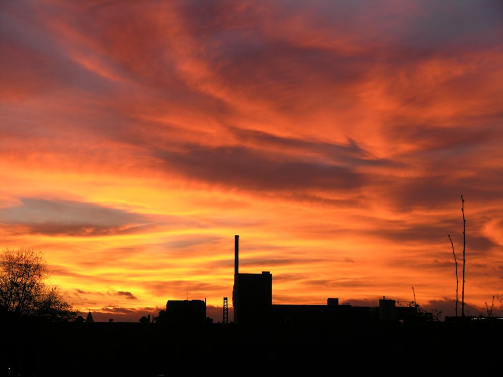 silhouette of buildings during sunset