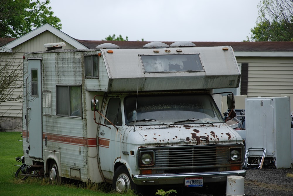 white and brown rv trailer