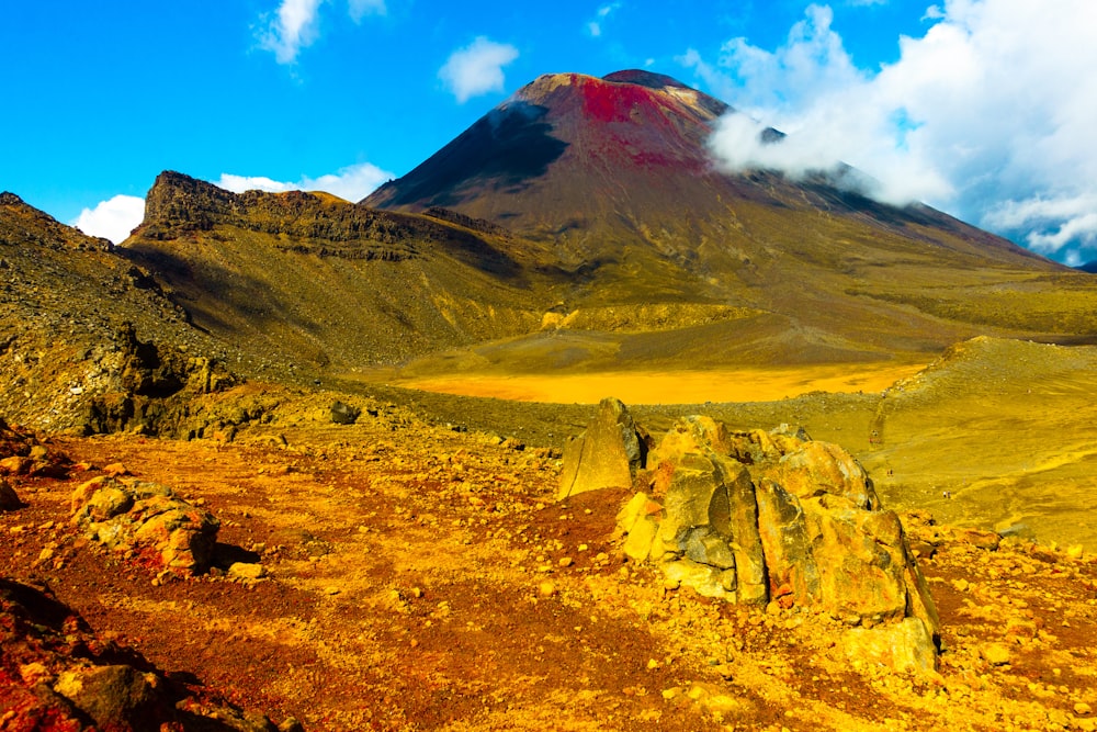 brown and green mountain under blue sky during daytime