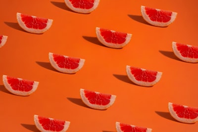 orange and white floral textile produce teams background
