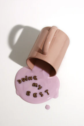 pink ceramic mug with love print