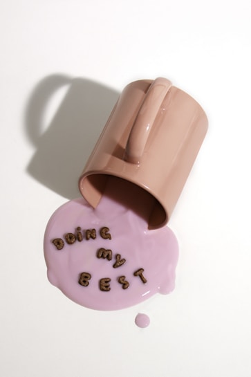 pink ceramic mug with love print