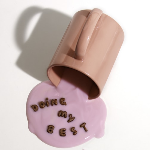 pink ceramic mug with love print