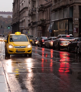 yellow car on road during daytime