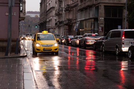 yellow car on road during daytime