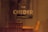 The image features the word 'CHEDER' in large, bold letters on a blurry background. Above it is a smaller text written in Hebrew. The setting appears to be indoors with warm lighting, and there’s a vague outline of furniture, such as chairs, in the background.