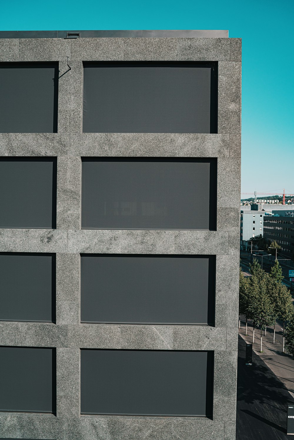 white concrete building under blue sky during daytime