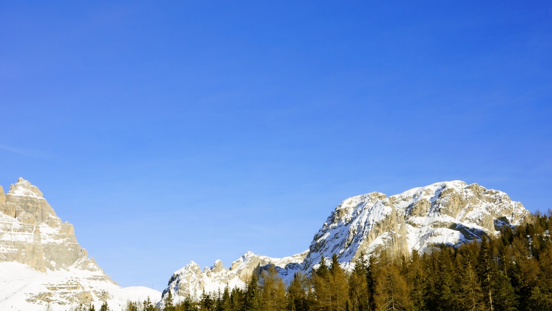 snow covered mountain during daytime