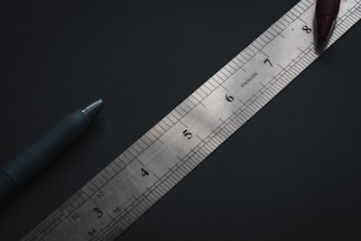 blue pen on black surface math zoom background