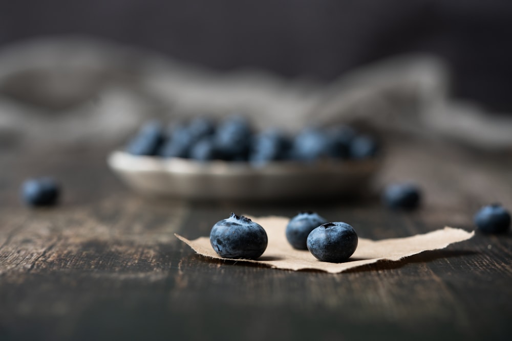 blue and white stones on brown wooden table