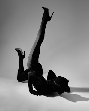 woman in black leather boots
