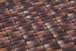 Close-up view of vibrant tile roofing materials.