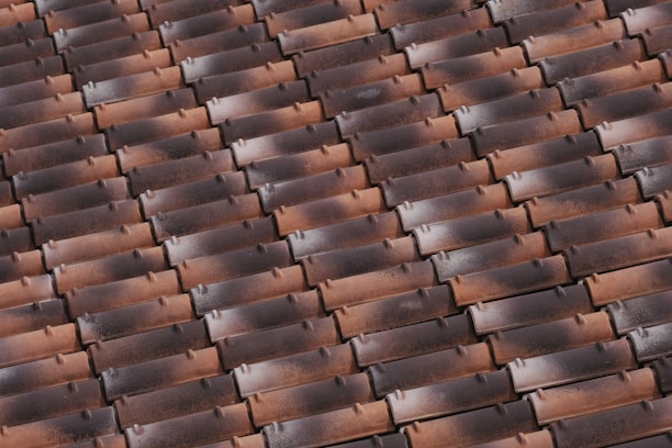A close-up of a beautifully installed roof tile.