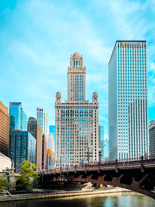 city skyline under blue sky during daytime in Chicago Riverwalk United States