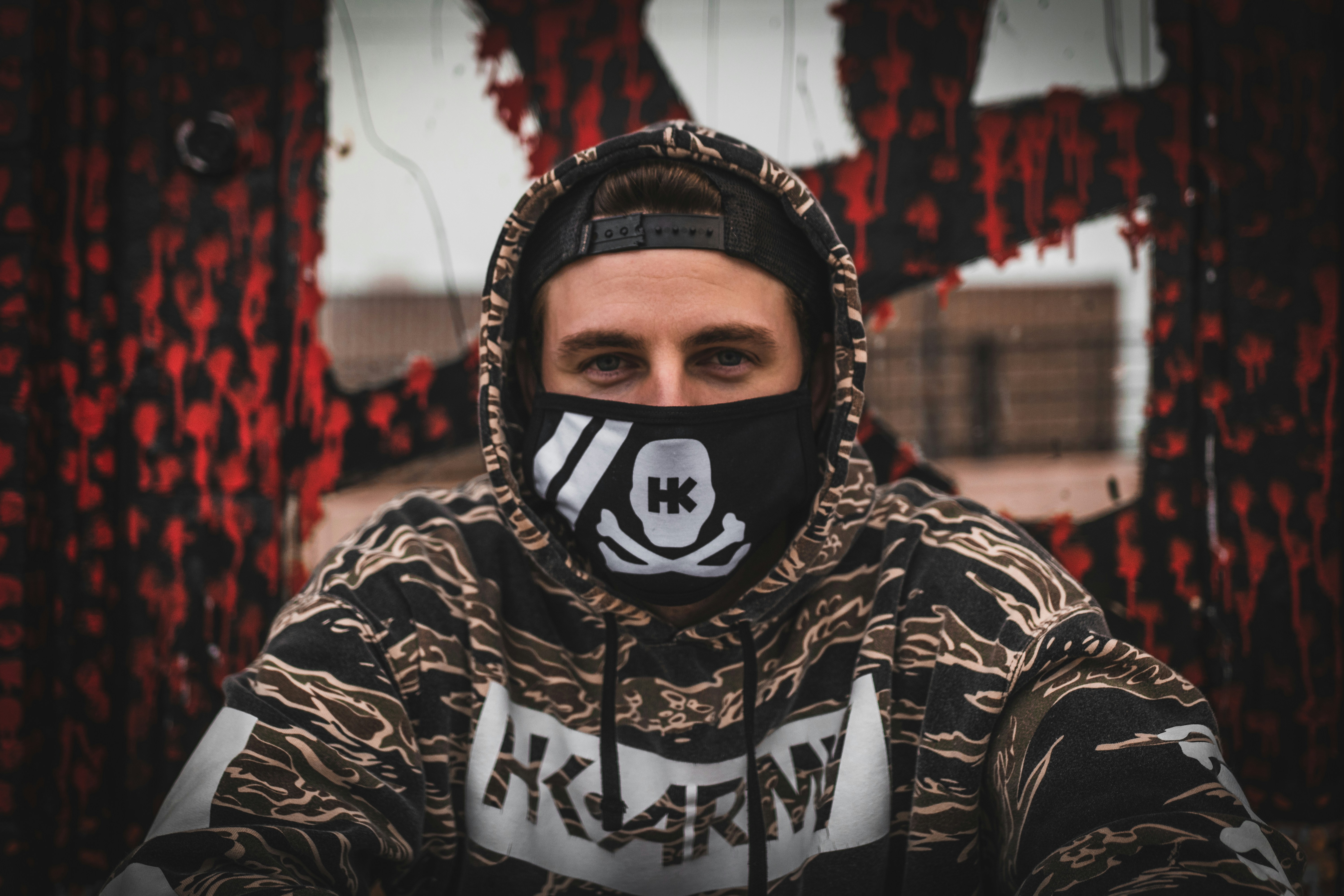 person wearing black and white floral hijab