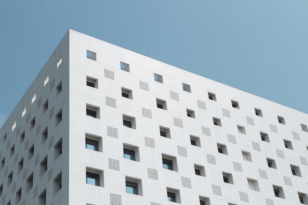 white concrete building under blue sky during daytime