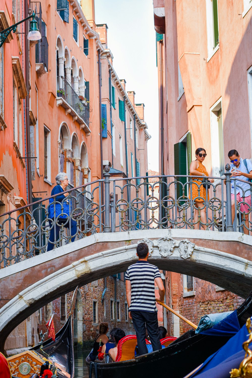 people walking on bridge during daytime