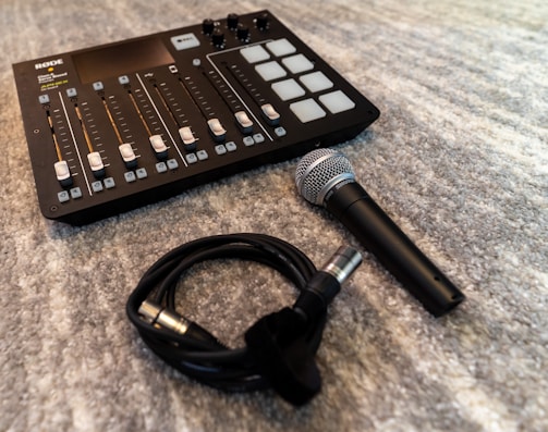 Sound system setup with mixers and microphones ready for a live event.