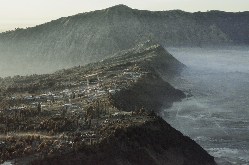 aerial view of city near mountain during daytime