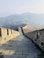 brown brick wall on mountain during daytime